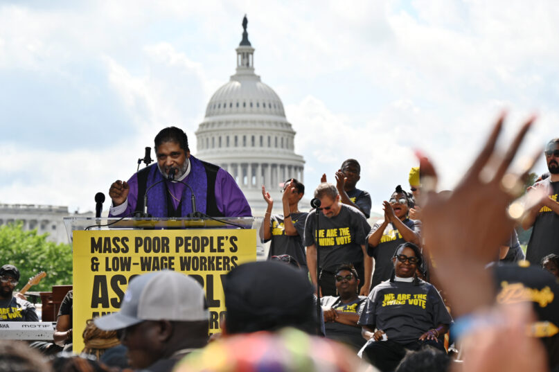 The Rev. William Barber addresses a crowd at a demonstration organized by the Poor People's Campaign outside the U.S. Capitol on June 29, 2024. (RNS photo/Jack Jenkins)