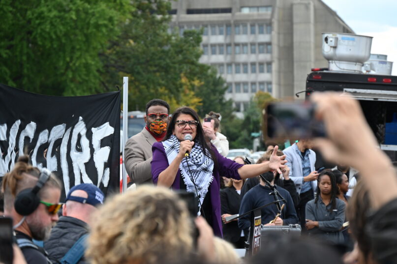 Rep. Rashida Tlaib (D-Mich) addresses the crowd at a protest on the National Mall calling for a ceasefire in Gaza. RNS Photo by Jack Jenkins