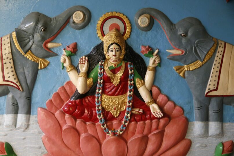 Relief of the Hindu goddess Lakshmi from a temple in India. Godong/Universal Images Group via Getty Images
