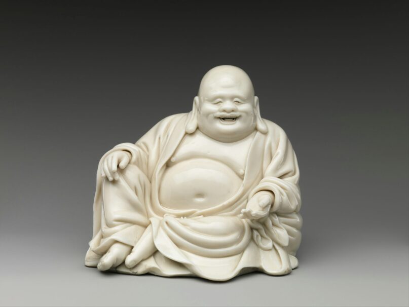 Porcelain ‘Laughing Buddha’ image, China, 17th-18th century. Metropolitan Museum of Art