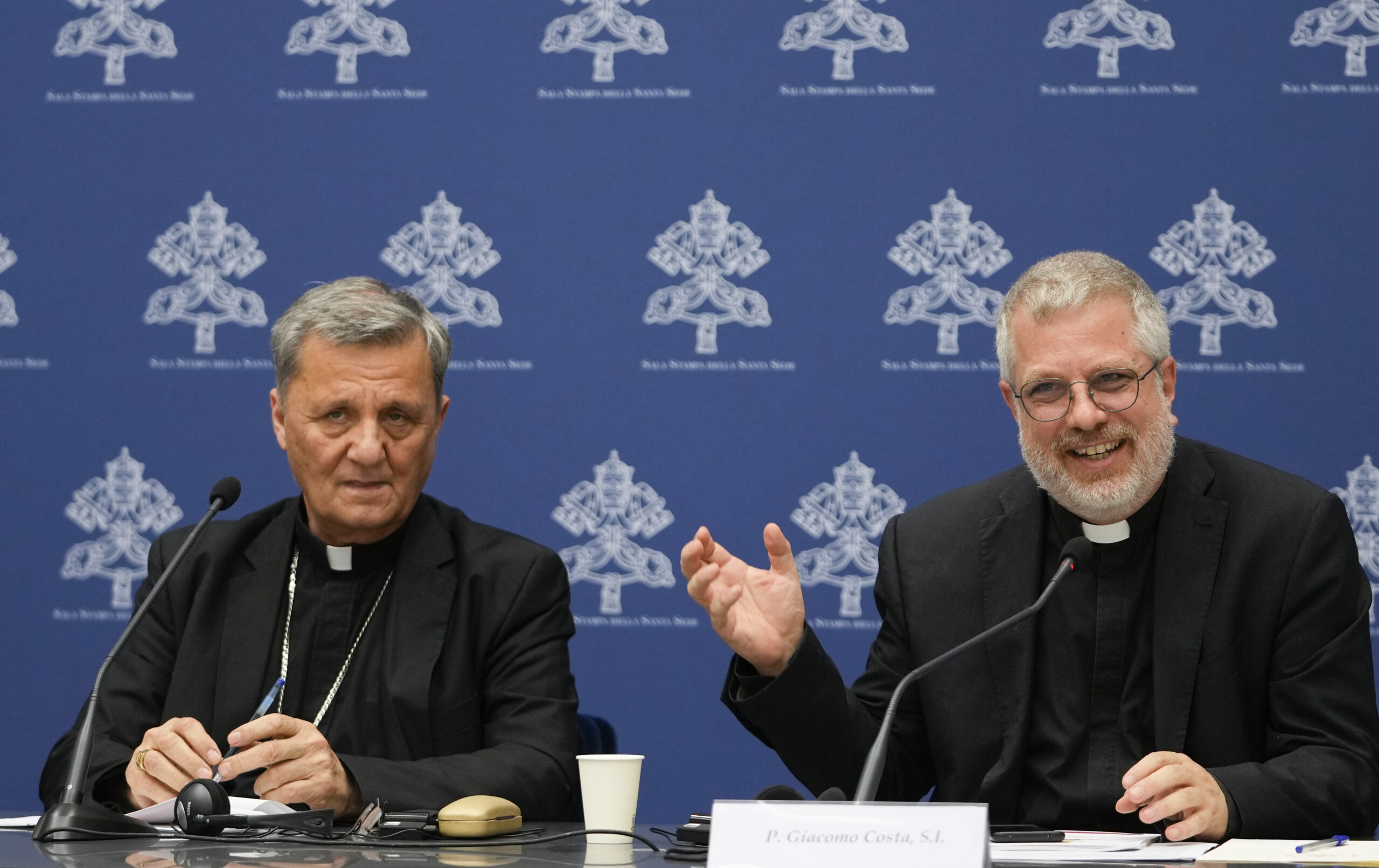 Cardinal Mario Grech and father Giacomo Costa attend a press conference to present the "Instrumentum Laboris", a preparatory document in view of the 16th Ordinary General Assembly of the Synod of Bishops, at the Vatican,Tuesday, July 9, 2024. (AP Photo/Alessandra Tarantino)