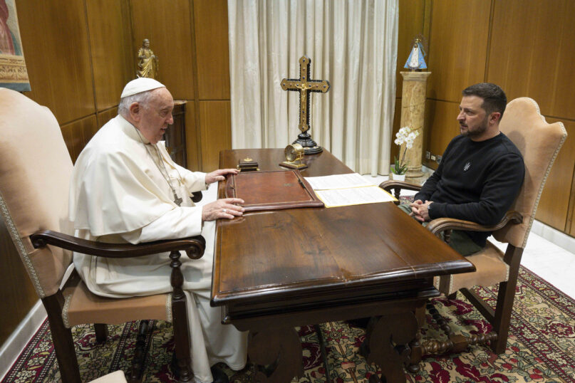 This image made available by Vatican News shows Pope Francis meeting Ukrainian President Volodymyr Zelenskyy during a private audience at The Vatican, Saturday, May 13, 2023. (Vatican News)