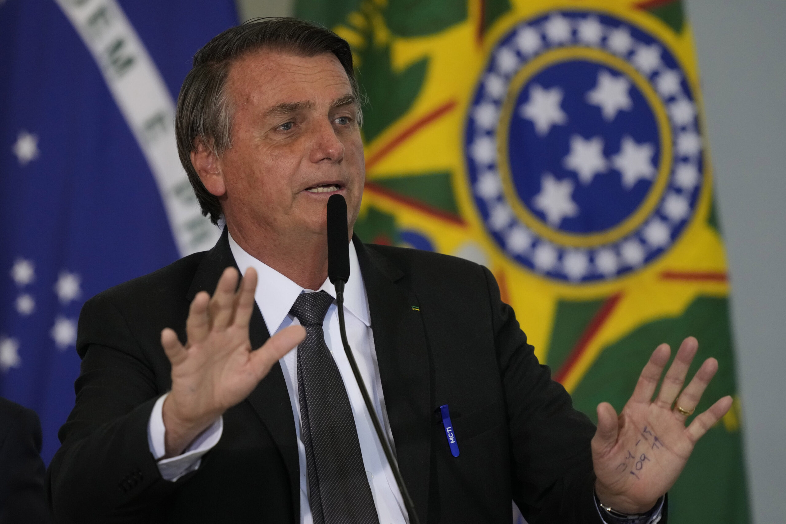 Brazil's President Jair Bolsonaro speaks during a ceremony at the Planalto presidential palace, in Brasilia, Brazil, Tuesday, July 13, 2021. (AP Photo/Eraldo Peres)