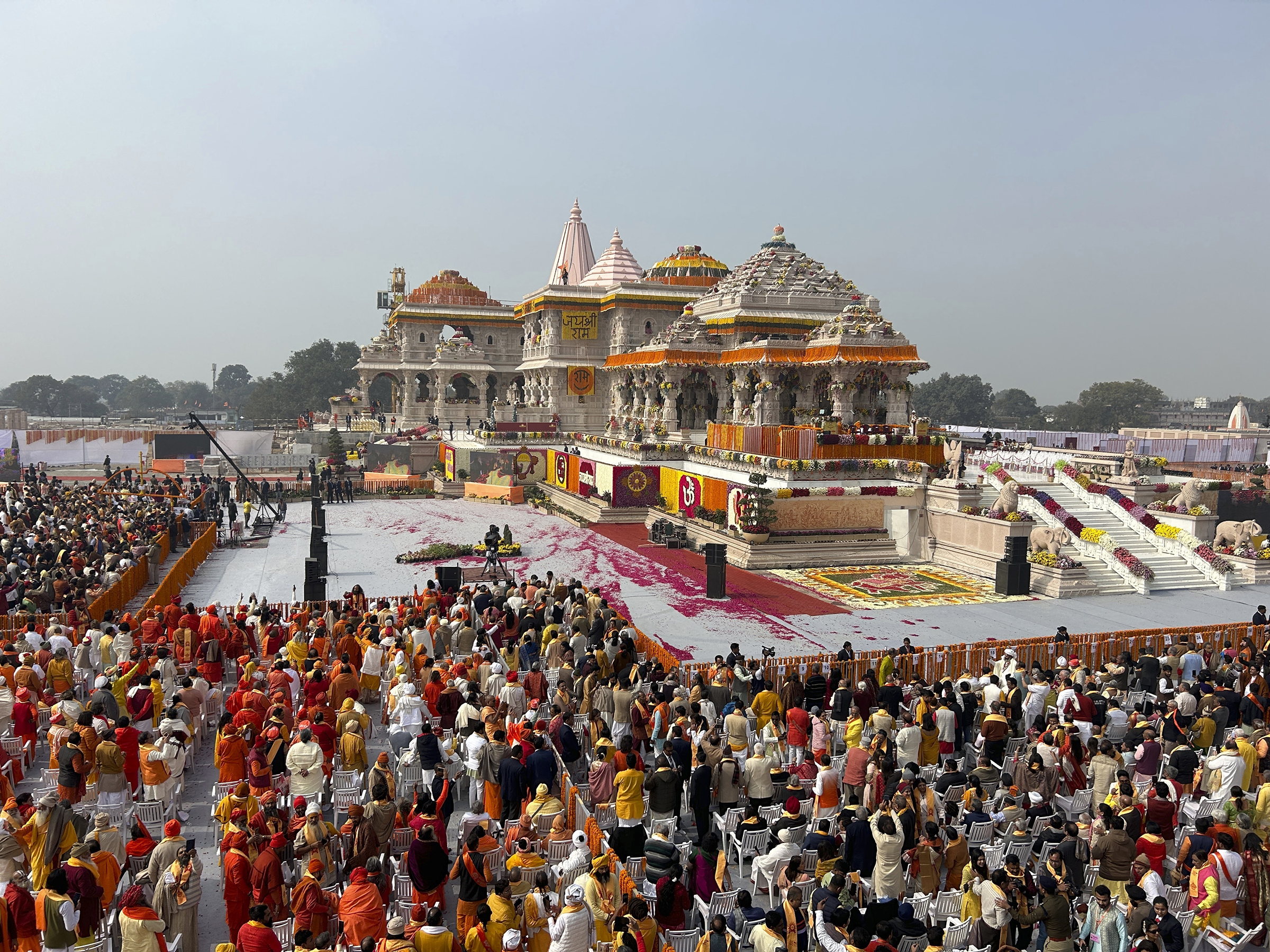 A general view of the audience during the opening of the Ram Mandir, a temple dedicated to Hindu deity Lord Ram, in Ayodhya, India, Monday, Jan. 22, 2024. Indian Prime Minister Narendra Modi is set to open the controversial Hindu temple built on the ruins of an ancient mosque in the holy city of Ayodhya in a grand event that is expected to galvanize Hindu voters months before a general election. (AP Photo/Rajesh Kumar Singh)