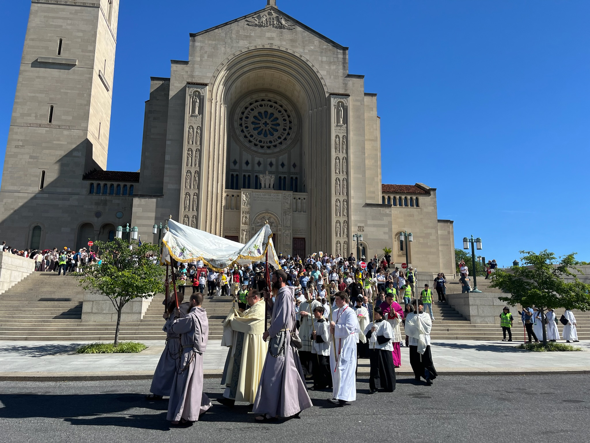 Participants in the the National Eucharistic Pilgrimage leave the Basilica of the National Shrine of the Immaculate Conception, Saturday morning, June 8, 2024, in Washington, D.C. (RNS photo/Aleja Hertzler-McCain)