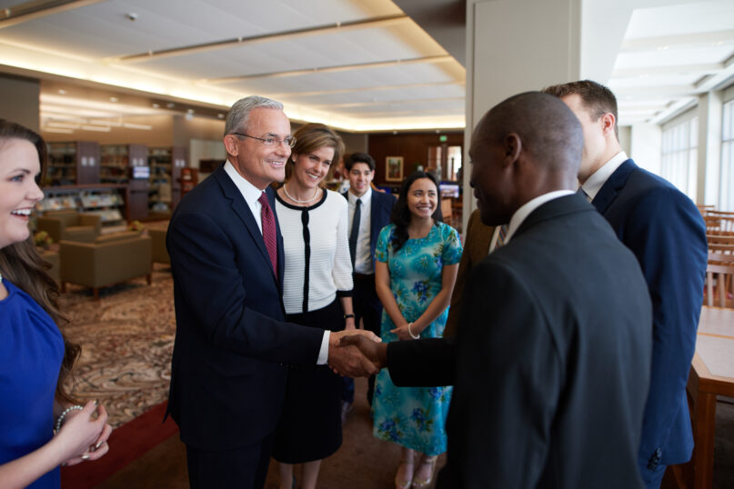 Elder Patrick Kearon and his wife, Jennifer, meet with a group of young adults prior to the World Wide Devotional for young adults in Salt Lake City, Utah, on May 6, 2018.  (Photo © 2023 by Intellectual Reserve, Inc. All rights reserved.)