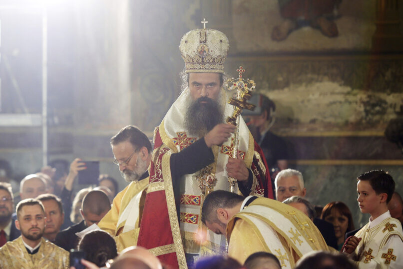 Newly elected Bulgarian Patriarch Daniil blesses the people during his enthronement ceremony at Alexander Nevsky Cathedral in Sofia, Bulgaria, Sunday, June 30, 2024. Bulgaria's Orthodox Church on Sunday elected Daniil, a 52-year-old metropolitan considered to be pro-Russian, as its new leader in a disputed vote that reflects the divisions in the church and in the society. (AP Photo/Valentina Petrova)