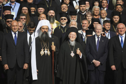 Istanbul-based Ecumenical Patriarch Bartholomew I, center, the spiritual leader of the world's Orthodox Christians, poses next to the newly elected Bulgarian Patriarch Daniil during a family photo after his enthronement ceremony at Alexander Nevsky Cathedral in Sofia, Bulgaria, Sunday, June 30, 2024. Bulgaria's Orthodox Church on Sunday elected Daniil, a 52-year-old metropolitan considered to be pro-Russian, as its new leader in a disputed vote that reflects the divisions in the church and in the society. (AP Photo/Valentina Petrova)