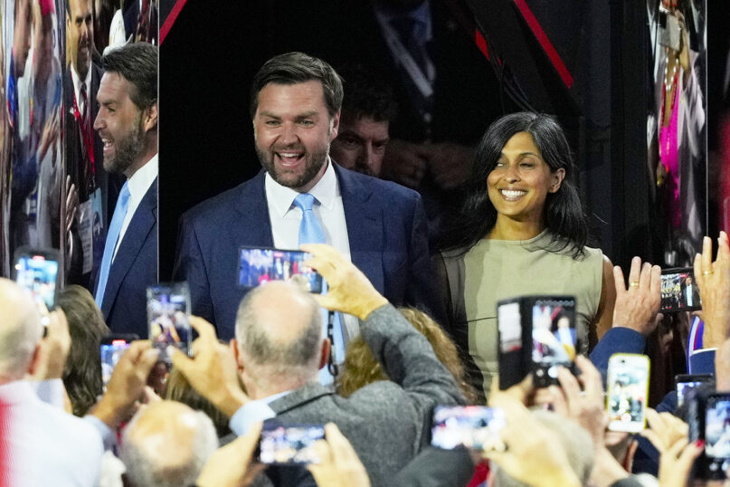 Republican vice presidential candidate Sen. JD Vance, R-Ohio, left, and his wife, Usha Chilukuri Vance, right, are introduced on the first day during the Republican National Convention, July 15, 2024, in Milwaukee. (AP Photo/J. Scott Applewhite)