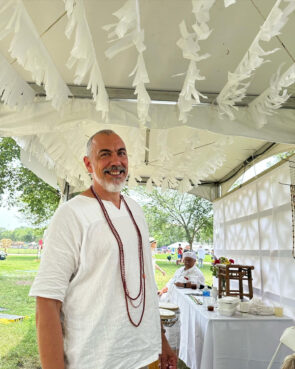 Aníbal Mejía at the Smithsonian Folklife festival last summer in late June 2023, on the National Mall in Washington, D.C. Mejía was with the group Egbe Omo Alairá presenting Candomblé arts and culture as part of the festival. (Courtesy photo)