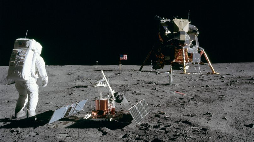 Astronaut Buzz Aldrin next to the Passive Seismic Experiment Package with Eagle in the background. Photo by Neil Armstrong/NASA/Creative Commons