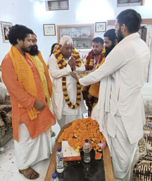 Awadhesh Prasad, center, is blessed by Swami Ram Das and other Hindu clerics at Sidh Peeth Mandir in Ayodhya, India, on June 5, 2024, the day after Indian elections. (Courtesy photo)