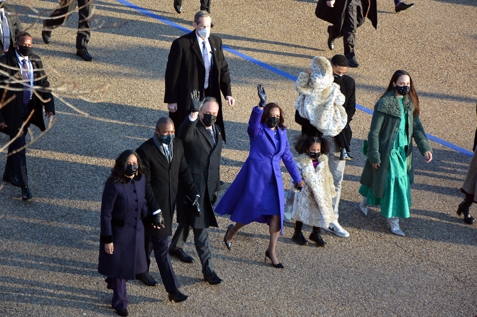 Vice President Kamala Harris, center, and her husband, Doug Emhoff, and family walk in front of the White House during a presidential escort to the White House, Jan. 20, 2021, in Washington. RNS photo by Jack Jenkins