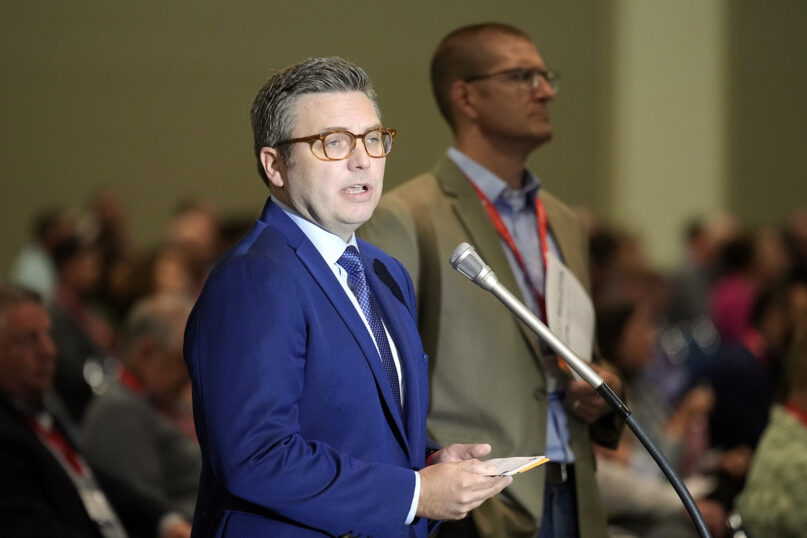 Brent Leatherwood speaks from the floor of the Southern Baptist Convention annual meeting at the Indiana Convention Center in Indianapolis, Wednesday, June 12, 2024. (RNS photo/AJ Mast)