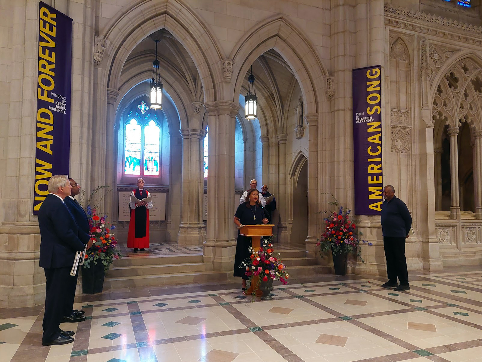 Elizabeth Alexander, center, recites her poem "American Song" during an unveiling and dedication ceremony at the Washington National Cathedral for the new stained-glass windows with a theme of racial justice, Saturday, Sept. 23, 2023, in Washington. RNS photo by Adelle M. Banks