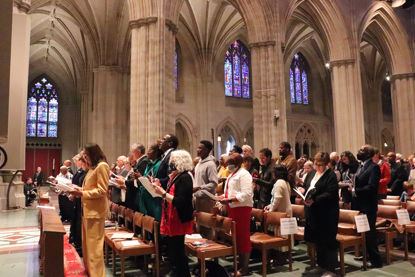 Hundreds of people attend an unveiling and dedication ceremony at the Washington National Cathedral for new stained-glass windows, Saturday, Sept. 23, 2023, in Washington. RNS photo by Adelle M. Banks