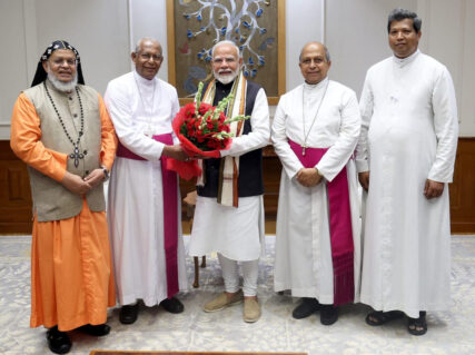 Indian Prime Minister Narendra Modi, center, with Archbishop Andrews Thazhath, second from left, the president of the Catholic Bishops’ Conference of India, along with other clergy at a meeting in New Delhi, India, July 12, 2024. (Photo by PMO Office)