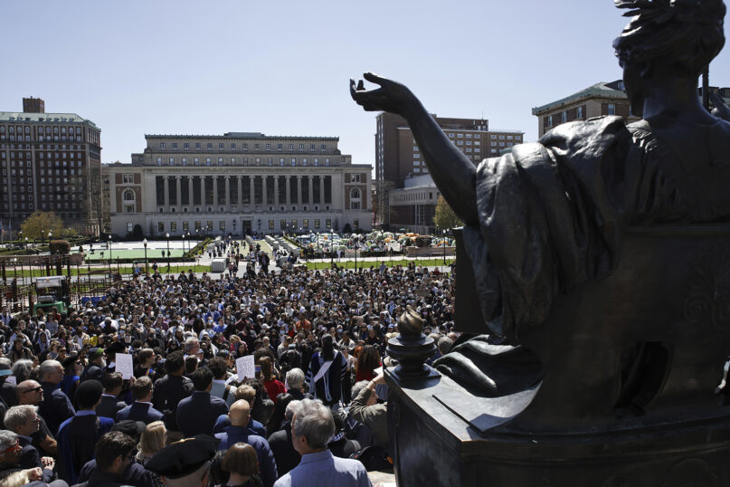 Columbia University professors speak in solidarity with their students about their rights to protest free from arrest at the Columbia University campus in New York on April 22, 2024. (AP Photo/Stefan Jeremiah)