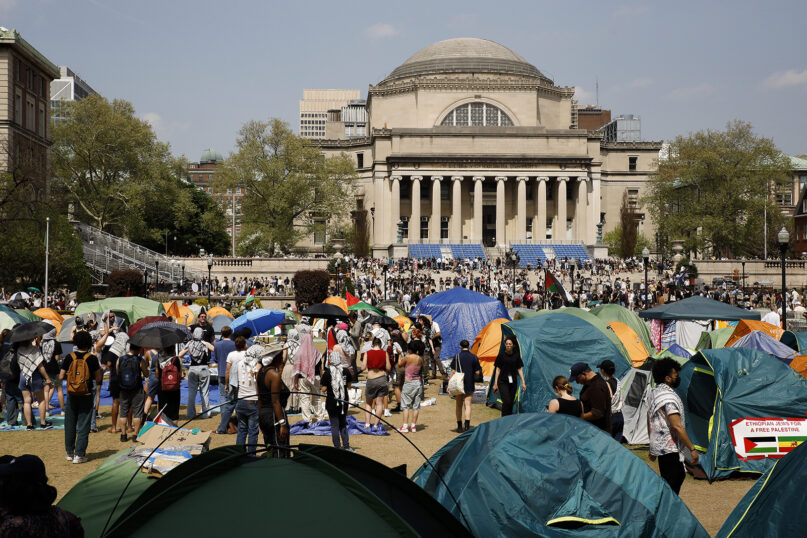 Student protesters gather inside their encampment on the Columbia University campus, April 29, 2024, in New York. (AP Photo/Stefan Jeremiah)