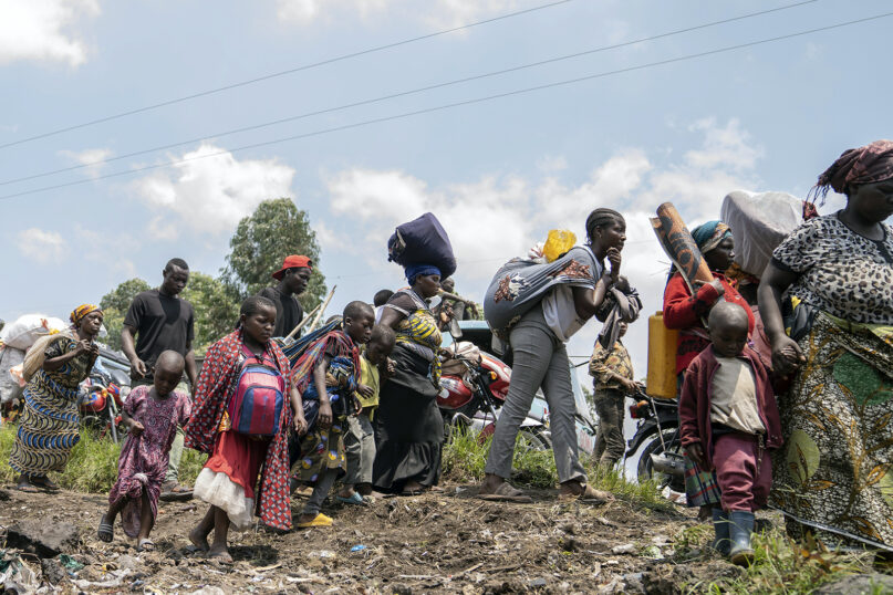 Thousands who are fleeing the ongoing conflict between government forces and M-23 rebels reach the entrance to the city of Goma, Feb. 7, 2024, in eastern Democratic Republic of Congo. The decades-old conflict in Congo’s mineral-rich east has “drastically deteriorated” since early 2022 and gotten even worse since last October, with sharp increases in sexual violence, the number of wounded and child recruitment, the top Red Cross official in the country has said. (AP Photo/Moses Sawasawa, File)