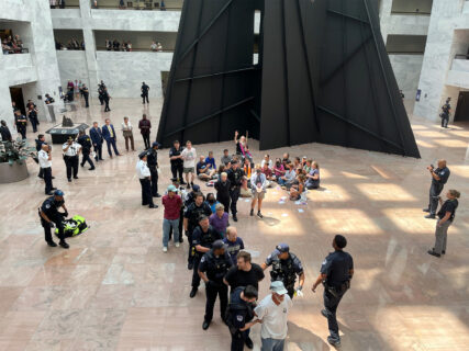 U.S. Capitol Police arrest anti-war protesters in the Hart Senate Office Building, Tuesday, July 30, 2024, in Washington. (RNS photo/Aleja Hertzler-McCain)