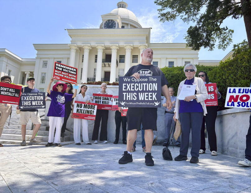 Abraham Bonowitz of Death Penalty Action and Esther Brown of Project Hope to Abolish the Death Penalty in Alabama stand with other death penalty opponents at a Tuesday, July 16, 2024, rally in front of the Alabama Capitol in Montgomery, Ala. (AP Photo/Kim Chandler)