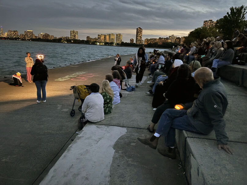 People attend a vigil at Montrose Harbor, Aug. 20, 2024, in Chicago. (RNS photo/Bob Smietana)