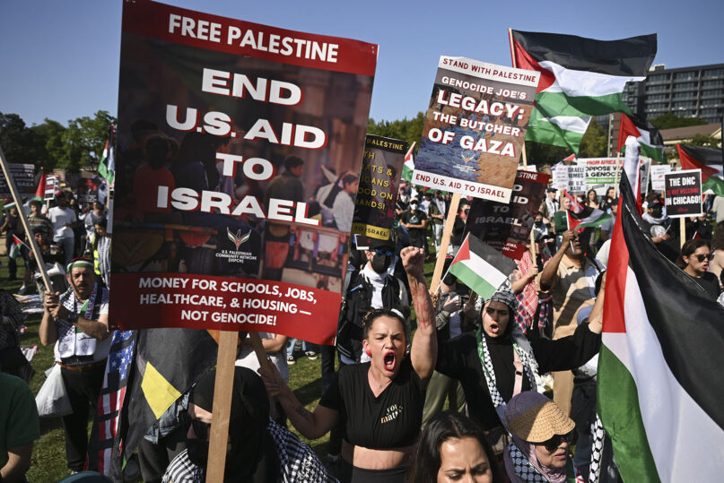 Protesters rally at a pro-Palestinian demonstration in Union Park during the Democratic National Convention, Aug. 21, 2024, in Chicago. (AP Photo/Noah Berger)