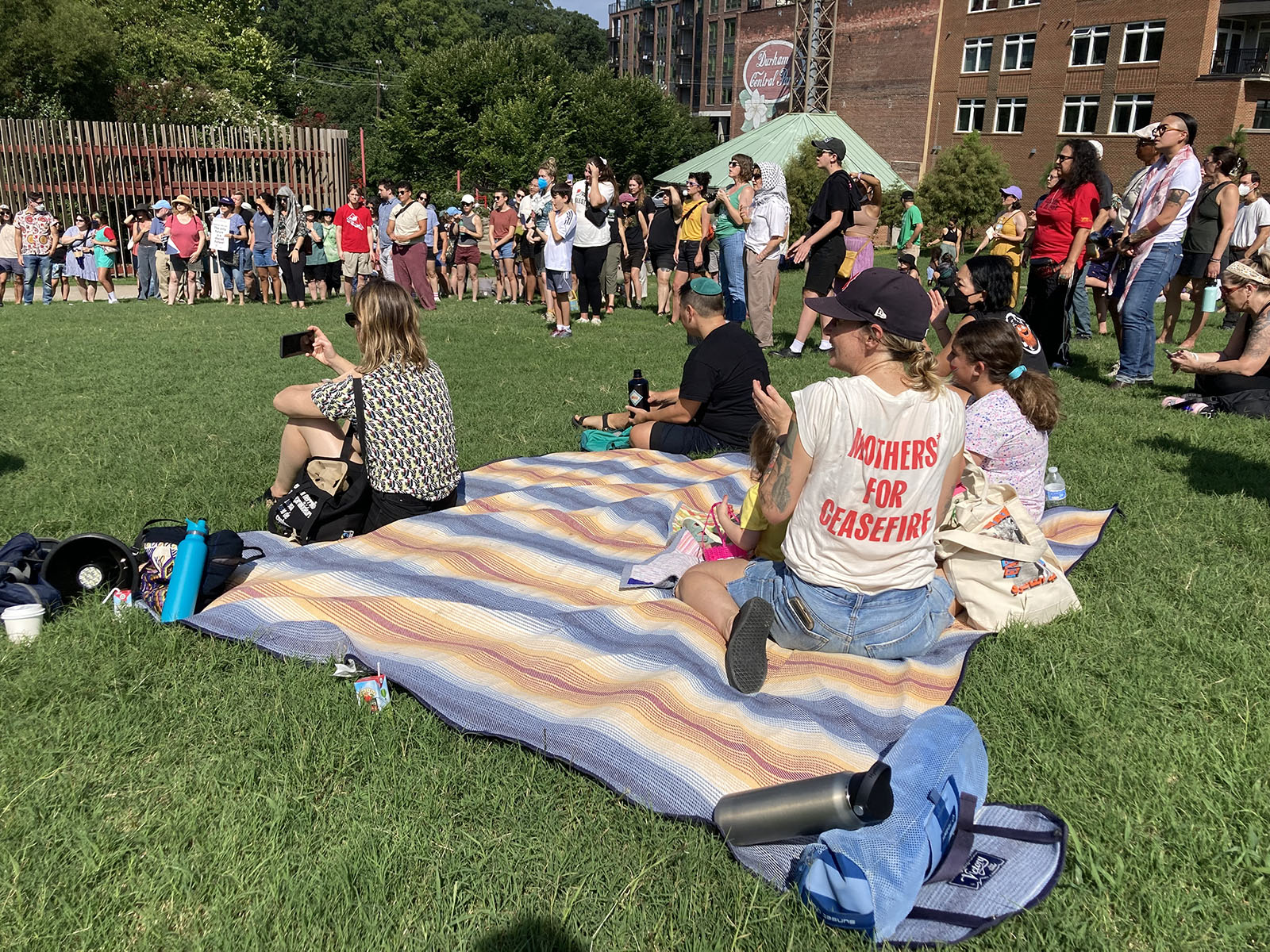 People attend an anti-war rally at Durham Central Park organized by the Mothers for Ceasefire group, Sunday, Aug. 18, 2024, in Durham, North Carolina. (RNS photo/Yonat Shimron)