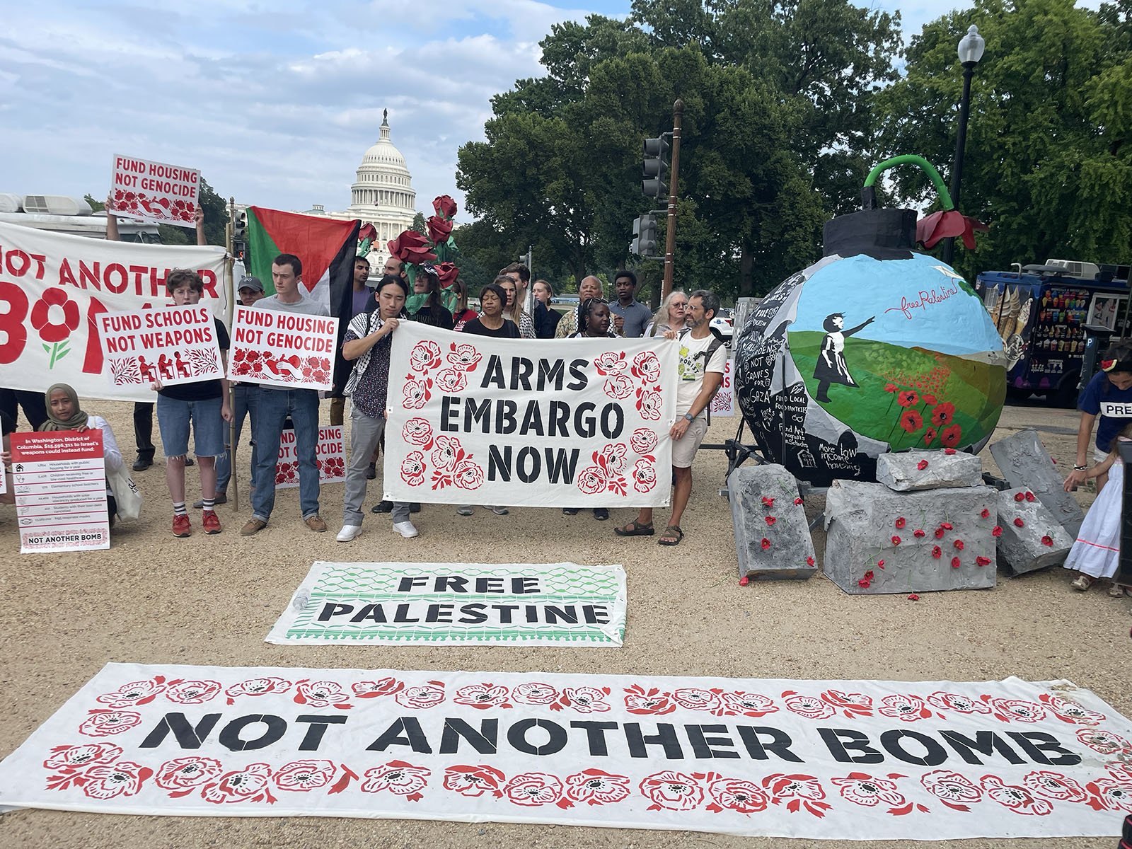 People attend a "Peace Bombing" rally by Uncommitted Vote for their DNC campaign of "Not Another Bomb", near the Capitol, Friday, Aug. 16, 2024, in Washington. (Photo by Reina Coulibaly)