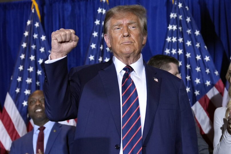 Republican presidential candidate former President Donald Trump reacts after speaking at a primary election night party in Nashua, N.H., Tuesday, Jan. 23, 2024. (AP Photo/Matt Rourke)