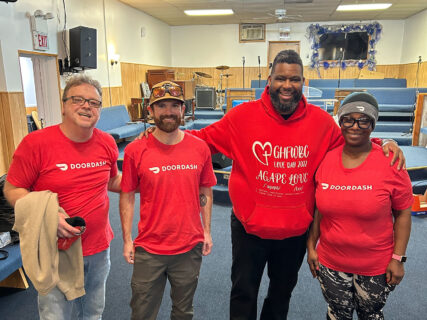 Pastor Cornelius Parks, second from right, and Good Hope Freewill Baptist Church have partnered with DoorDash to better serve the community in Chicago. (Photo courtesy Cornelius Parks)