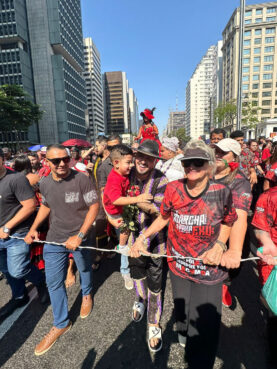 Jonathan Pires, center holding child, participates in the March for Eshu, Sunday, Aug. 18, 2024, in São Paulo, Brazil. (Photo courtesy Jonathan Pires)