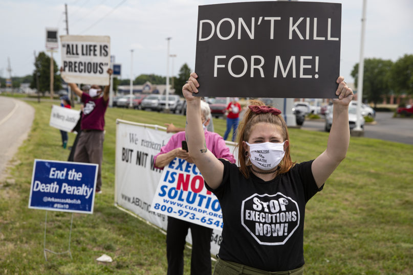 Protesters against the death penalty gather in Terre Haute, Ind., on July 15, 2020. (AP Photo/Michael Conroy)