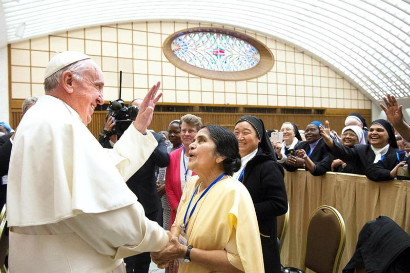 Pope Francis greets participants in a special audience with members of the International Union of Superiors General in the Paul VI hall at the Vatican, on May 12, 2016. Pope Francis created a commission to study whether women can be deacons in the Catholic Church, but the reports were never made public. (Photo courtesy L'Osservatore Romano)