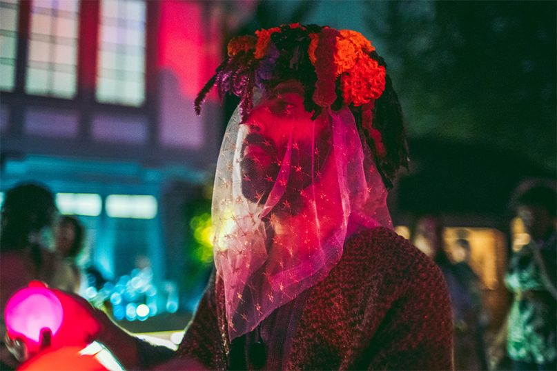 Levon Kafafian glides forward during their Ashoun Voki: Zharrankoum ceremonial procession during the autumnal equinox in 2019. Photo by Noah Elliot Morrison, courtesy of Levon Kafafian