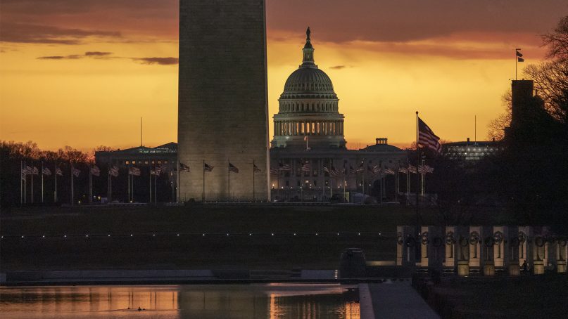 The Capitol and Washington Monument are seen at dawn as the partial government shutdown lurches into a third week with President Trump standing firm in his border wall funding demands, in Washington, on Jan. 7, 2019. After no weekend breakthrough to end a prolonged shutdown, newly empowered House Democrats are planning to step up pressure on Trump and Republican lawmakers to reopen the government. (AP Photo/J. Scott Applewhite)
