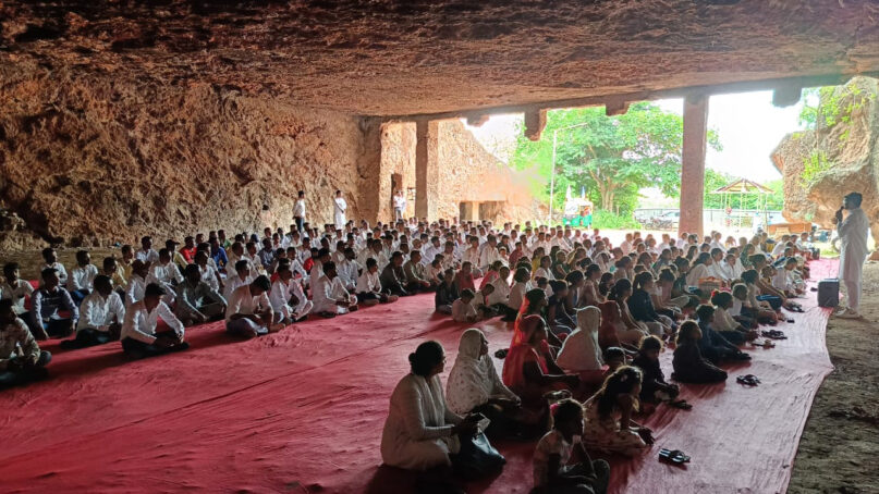 Members of the Swayam Sainik Dal, a civil rights group, meet at the Sana Buddhist Caves in the Gir-Somnath district of Gujarat, India, in September 2023. (Photo courtesy of SSD)