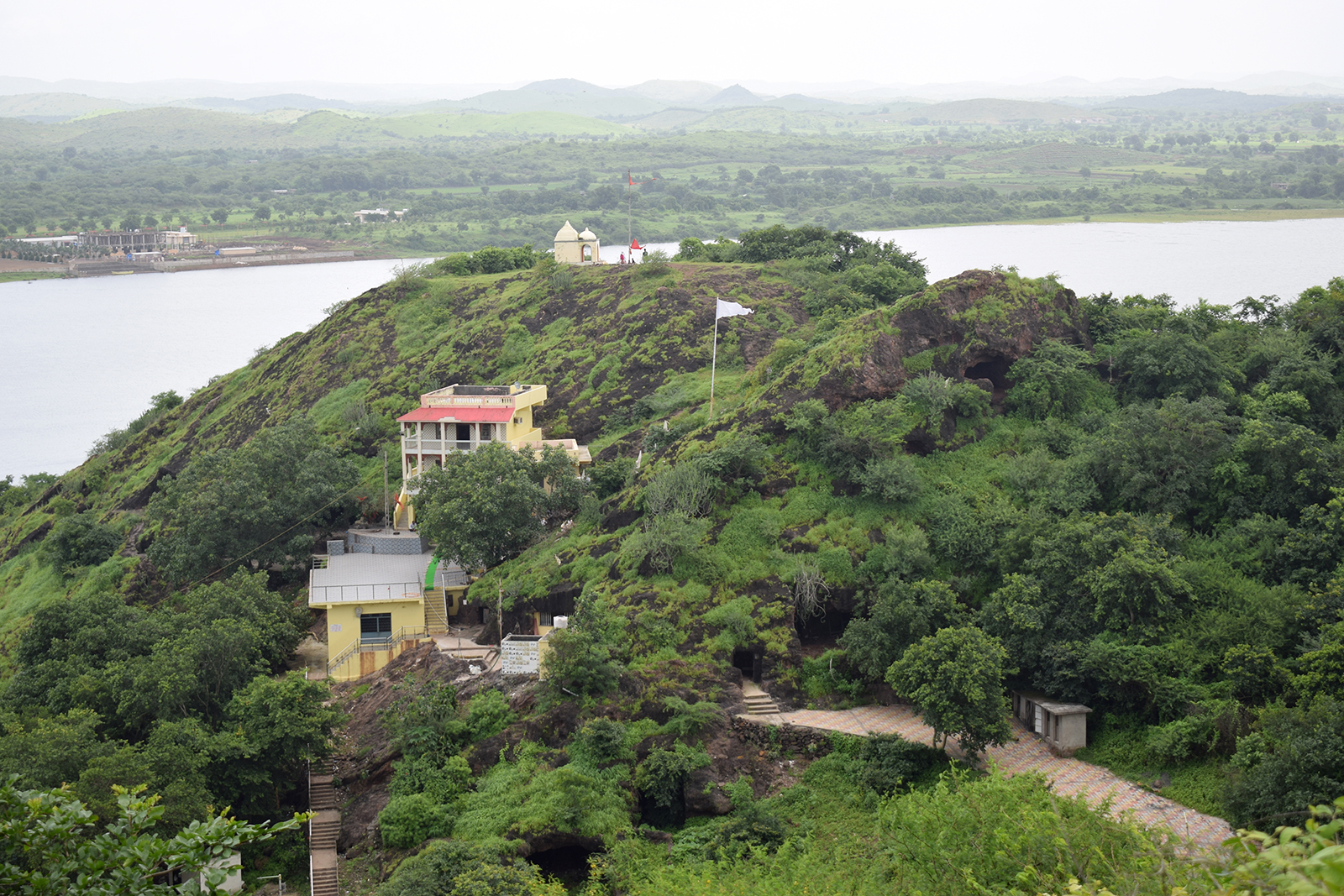 Hindu temples and other structures that have been built around the Sana Buddhist Caves in Gujarat, India. (Photo by Priyadarshini Sen)