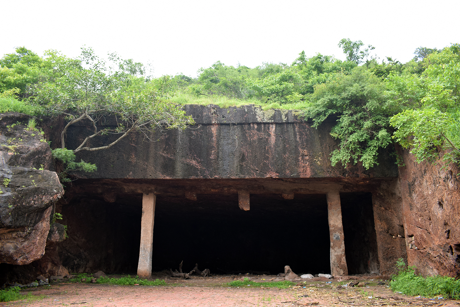 Only two pillars remain of the Abalmandap, a cave on the foothills that was used as a space for teachings and discussions on Buddha’s Dhamma, at the Sana Buddhist Caves in the Gir-Somnath district of Gujarat, India. The caves dates back to the first century B.C. (Photo by Priyadarshini Sen)