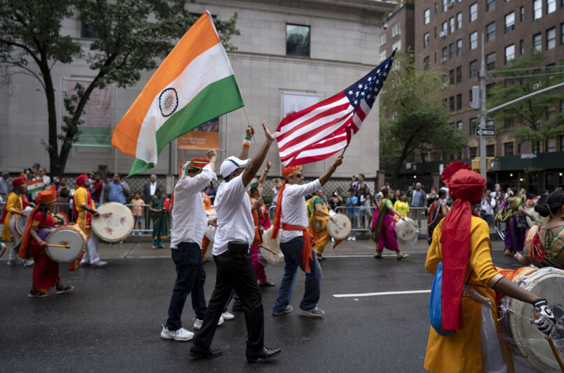 FILE - Participants march during the India Day Parade on Madison Ave. Sunday, Aug. 19, 2018, in New York. (AP Photo/Craig Ruttle, File)