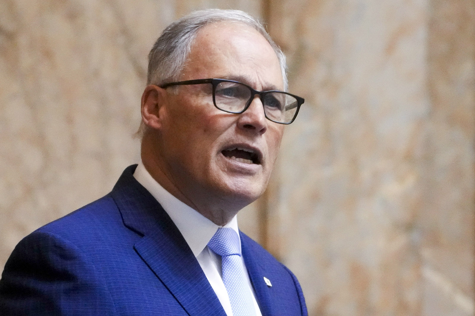 FILE - Washington Gov. Jay Inslee delivers his annual State of the State address to a joint legislative session in House chambers at the Washington state Capitol, Jan. 9, 2024, in Olympia, Wash. (AP Photo/Lindsey Wasson, File)