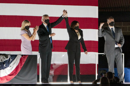 Democratic presidential candidate former Vice President Joe Biden and his wife Jill Biden and Democratic vice presidential candidate Sen. Kamala Harris, D-Calif., and her husband Douglas Emhoff, stand together on stage on the fourth day of the Democratic National Convention, Thursday, Aug. 20, 2020, outside of the Chase Center in Wilmington, Del. (AP Photo/Carolyn Kaster)