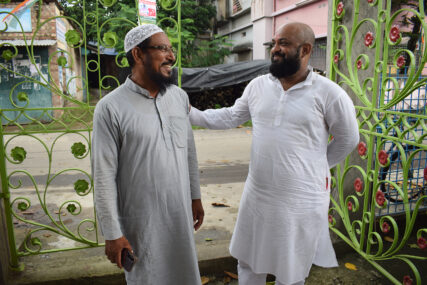 Imam Maulana Akhtar Ali, left, chats with Partha Sarathi Basu, who runs the Amanati Mosque, in the Barasat district of Bengal, India, on August 2, 2024. (Photo by Priyadarshini Sen)