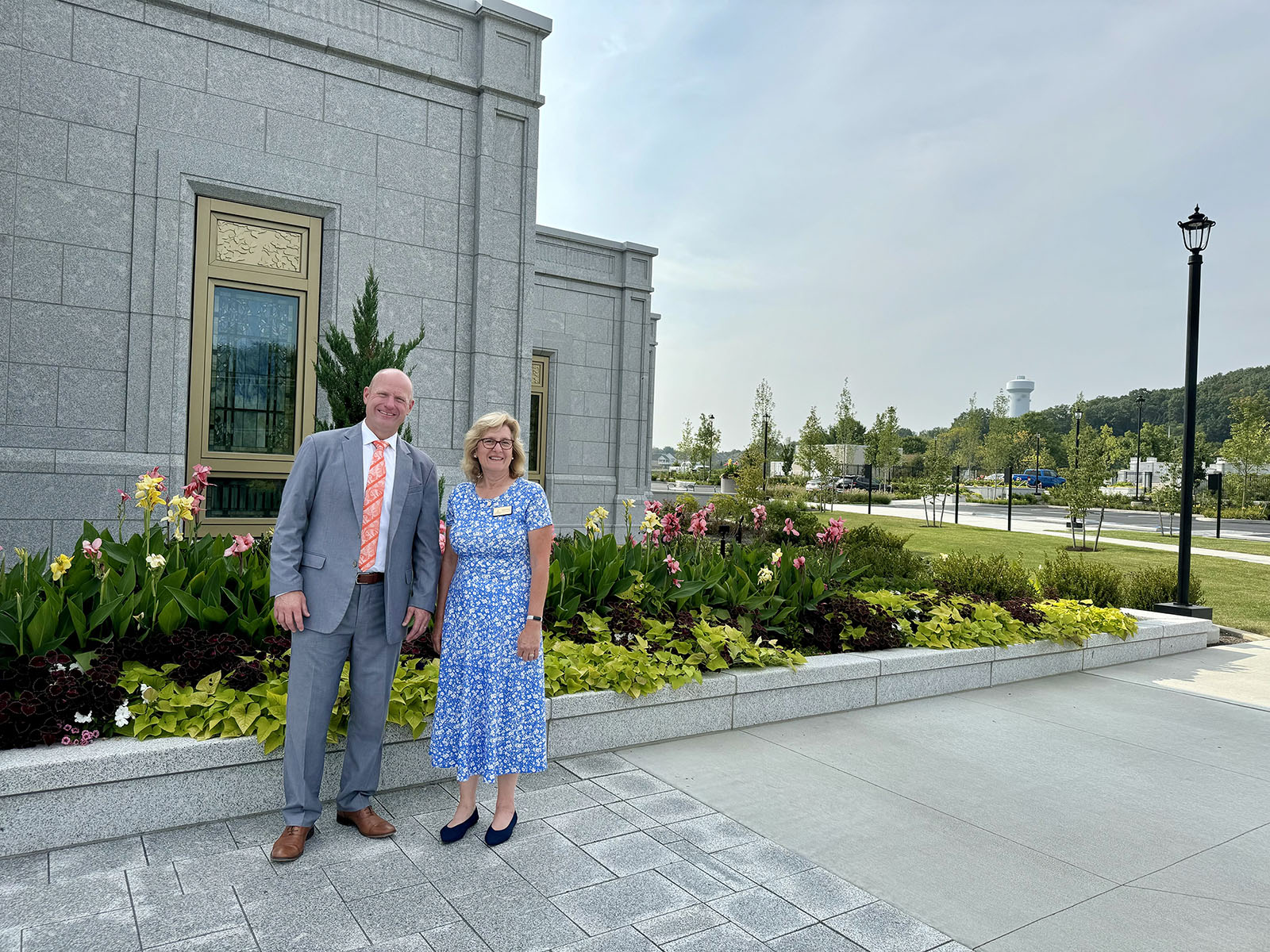 Chris Hoke, left, and Linda Johnson pose outside the new temple for The Church of Jesus Christ of Latter-day Saints near Pittsburgh, Pennsylvania. (RNS photo/Kathryn Post)