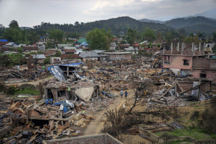 FILE- Dozens of houses lay in ruins after being vandalized and burned during ethnic clashes and rioting in Sugnu, in Manipur, India, June 21, 2023. For three months, Indian Prime Minister Narendra Modi has been largely silent on ethnic violence that has killed over 150 people in the remote state in India’s northeast. (AP Photo/Altaf Qadri, File)