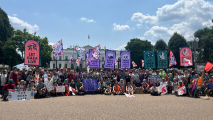 "All God’s Children March for a Ceasefire" participants pose together in front of the White House, Sunday, July 28, 2024, in Washington. (RNS photo/Aleja Hertzler-McCain)