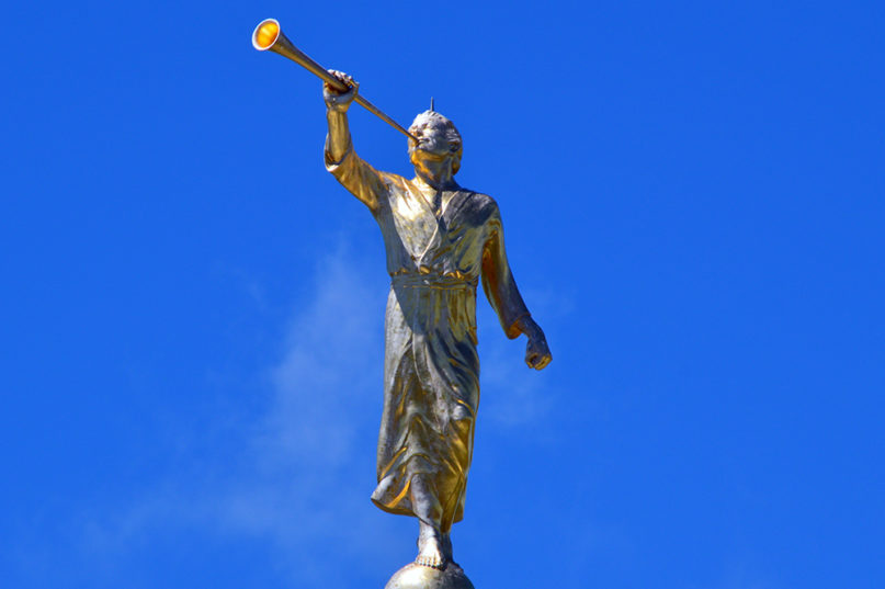 An angel Moroni statue sits atop a temple of The Church of Jesus Christ of Latter-day Saints. (Photo by Erika Wittlieb/Pixabay/Creative Commons)