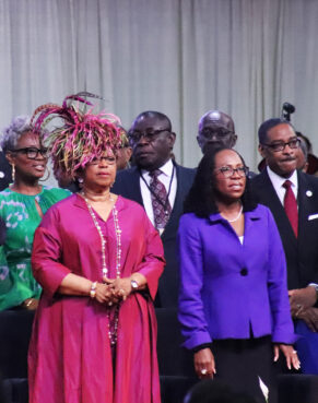 Helen Young, wife of Dr. Jerry Young, stands next to Supreme Court Justice Ketanji Brown Jackson on stage during the final day of the National Baptist Convention on Thursday, Sept. 5, 2024, in Baltimore. RNS photo by Adelle M. Banks