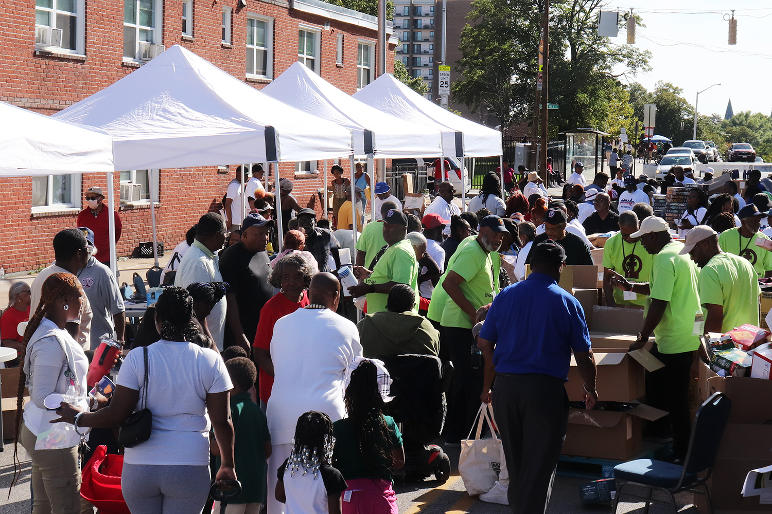 As part of the annual convention, an evangelism outreach activity was hosted Wednesday, Sept. 4, 2024, in West Baltimore, handing out a variety of items on a street closed to traffic for the afternoon. RNS photo by Adelle M. Banks